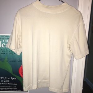 cream colored mock neck